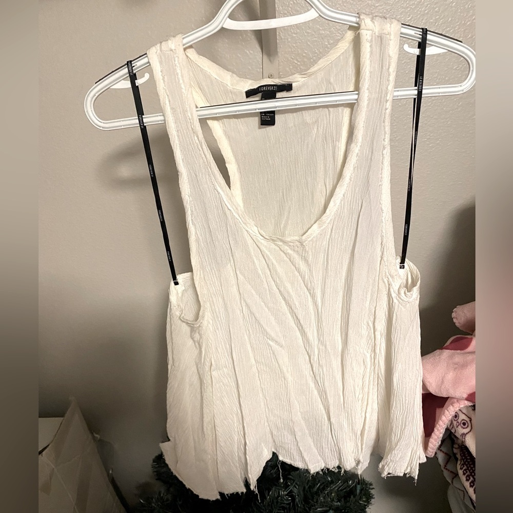 Forever 21 white racer back tank top.‎ Women’s size large.